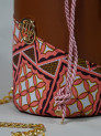 Petit sac seau en Wax Le Bonbon Brown Laced Pink