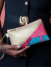 Pochette Miny Dorée et Corail wax  – Élégance artisanale | The Mad Shop