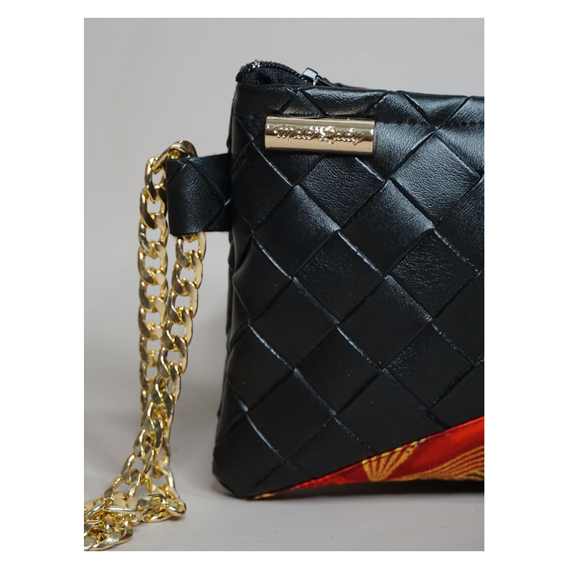 Pochette Miny noir et orange – Élégance artisanale | The Mad Shop