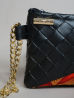 Pochette Miny noir et orange – Élégance artisanale | The Mad Shop