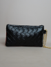Pochette Miny noir et orange – Élégance artisanale | The Mad Shop