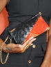 Pochette Miny noir et orange – Élégance artisanale | The Mad Shop